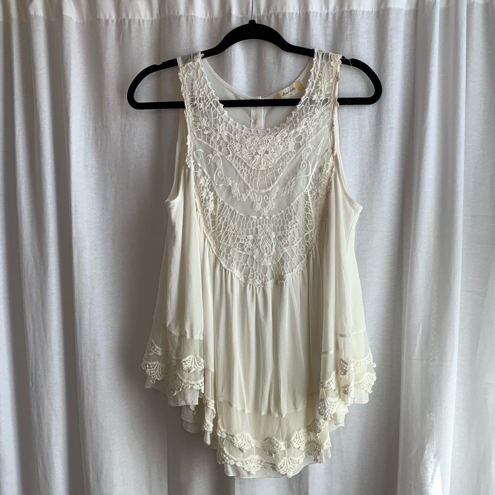 White embroidered bouse